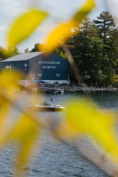 Winnisquam Marine through fall leaves