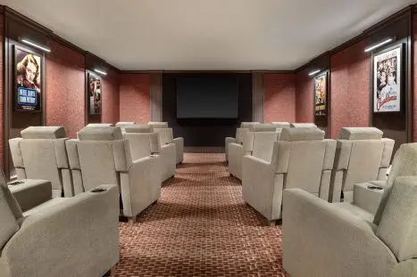 Private movie theater featuring plush seating and an intimate entertainment experience